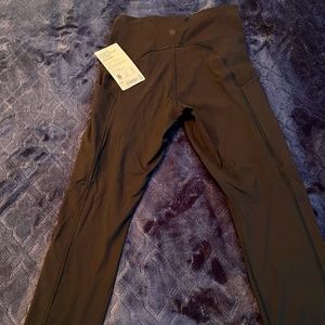 Athleta Ultimate Stash 7/8 Tight - Black XSP